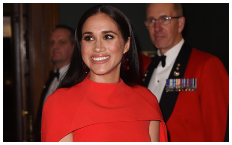 Meghan Markle volvió a Londres y brilló con un súper vestido en color rojo